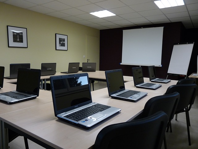 Computer Instructor assisting students
